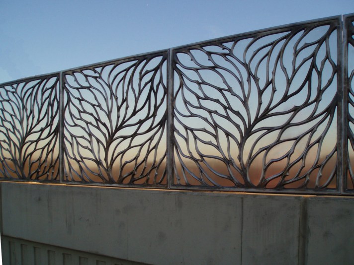 Bridge parapets over the Grand Uion canal in cast aluminium.